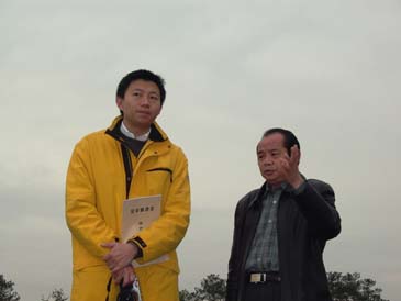 汪延倾听文物局汪利权局长的保护设想